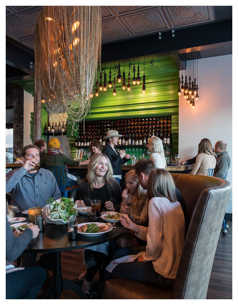 customers dining in feast in Bozeman, Montana in front of bar